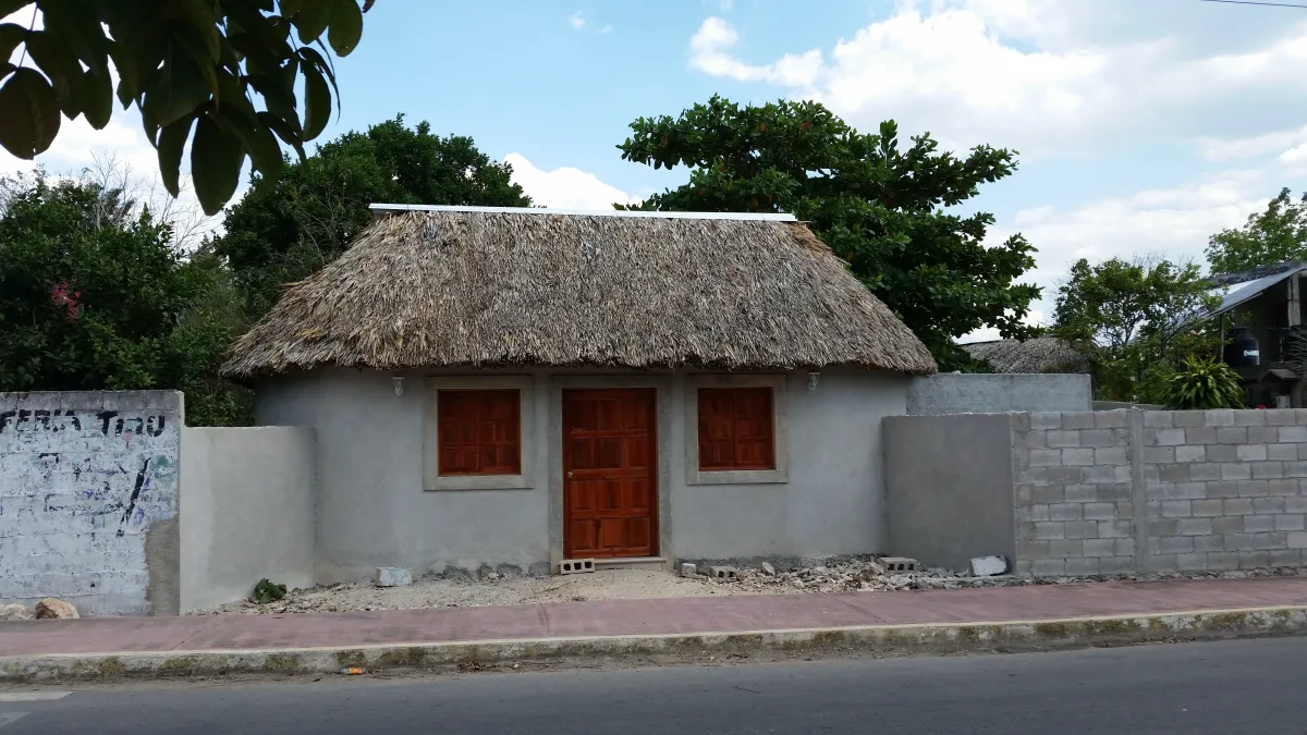 Traditional Maya house with palapa roof